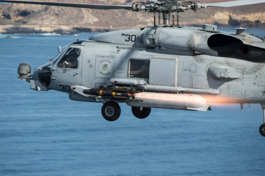 An MH-60R Sea Hawk helicopter, assigned to Helicopter Maritime Strike Squadron (HSM) 35, fires an AGM-114M Hellfire missile, April 5, 2016, near San Clemente Island, California, during a live-fire combat training exercise. HSM-35, the Navy's first composite expeditionary helicopter squadron, flies the MH-60R Sea Hawk helicopter and MQ-8B Fire Scout unmanned aircraft system. (U.S. Navy Combat Camera photo by Mass Communication Specialist 2nd Class Arthurgwain L. Marquez/Released)